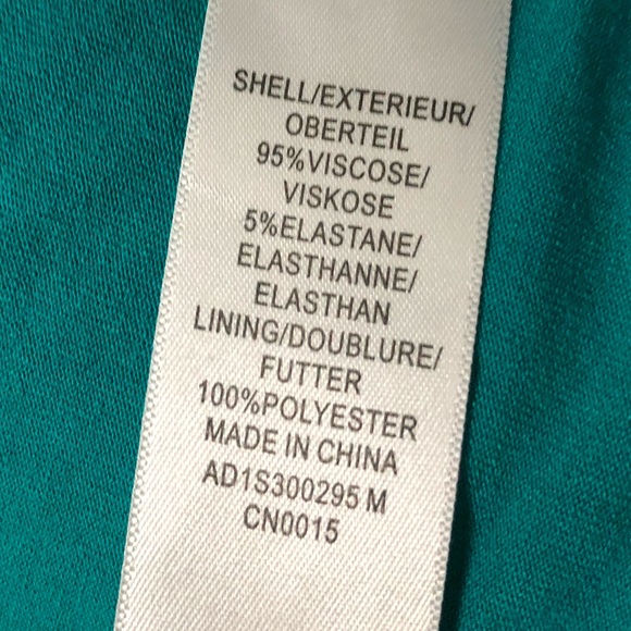 Adrianna Papell | Solid Sleeveless Shark Bite - Picture 6 of 7